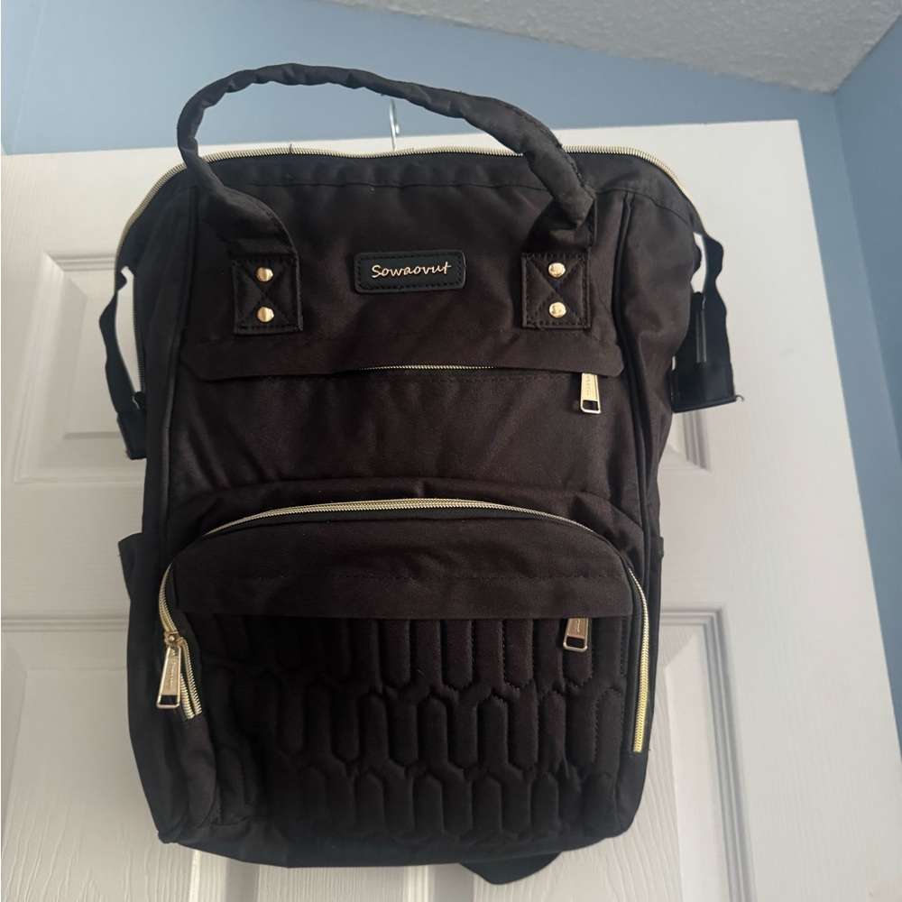 Black Backpack with Gold Accents